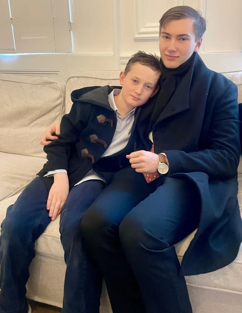 Two people sitting together