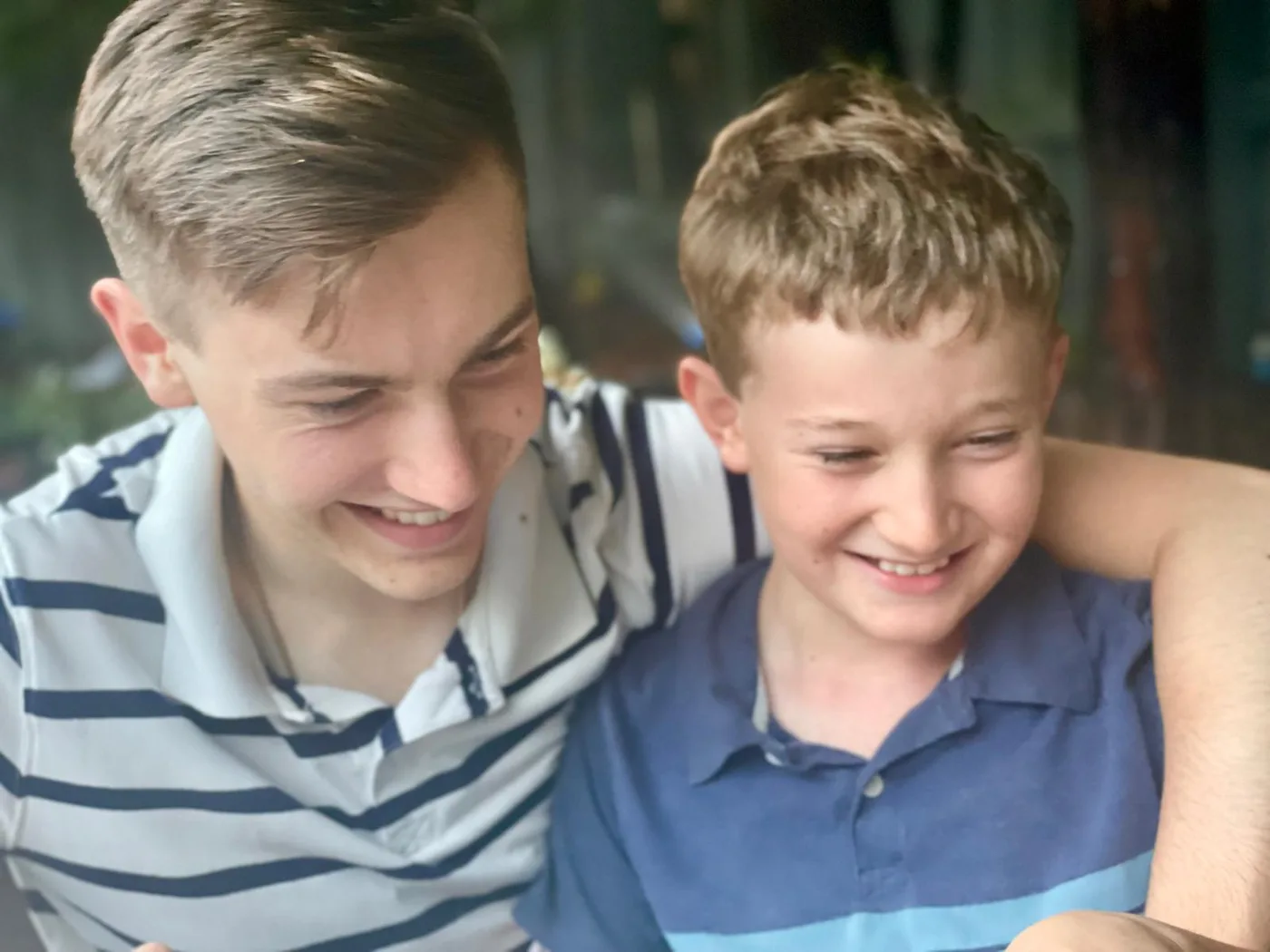Two people smiling together
