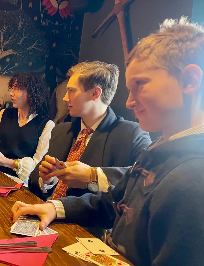 Friends talking around a table